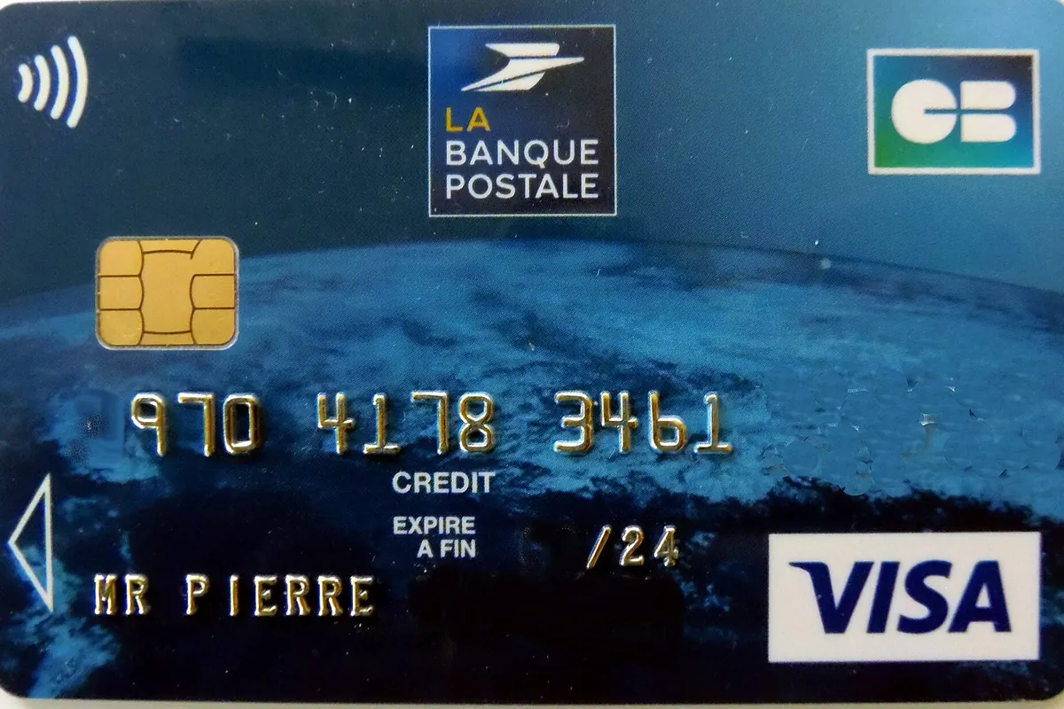 Close-up of a Visa debit card with its chip and contactless symbol