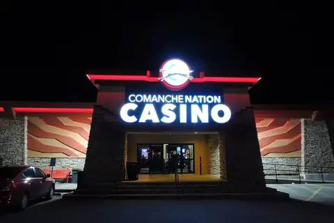 Comanche Nation Casino entrance lit up at night